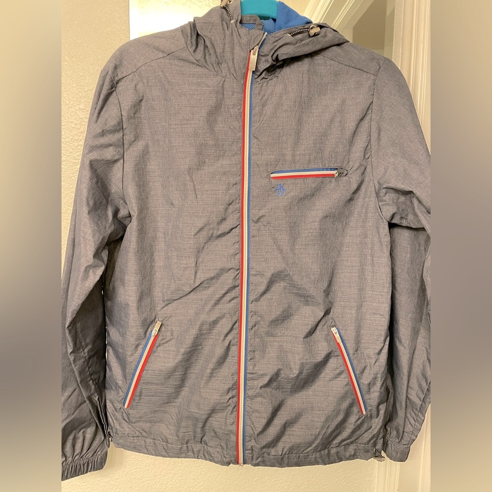 Munsing wear Penguin windbreaker with hood.